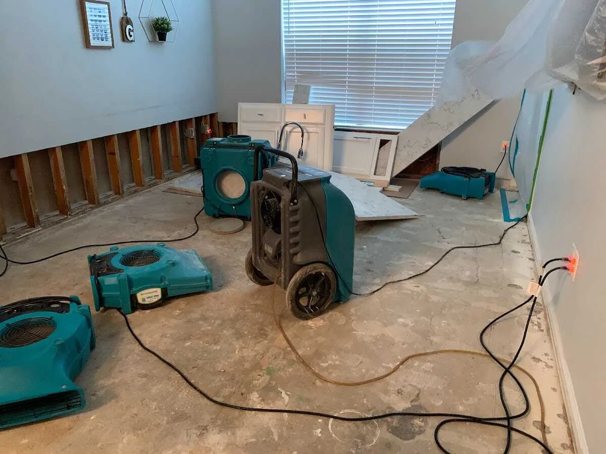 Dehumidifier in flood-cut room for Water Damage Restoration in Griffith